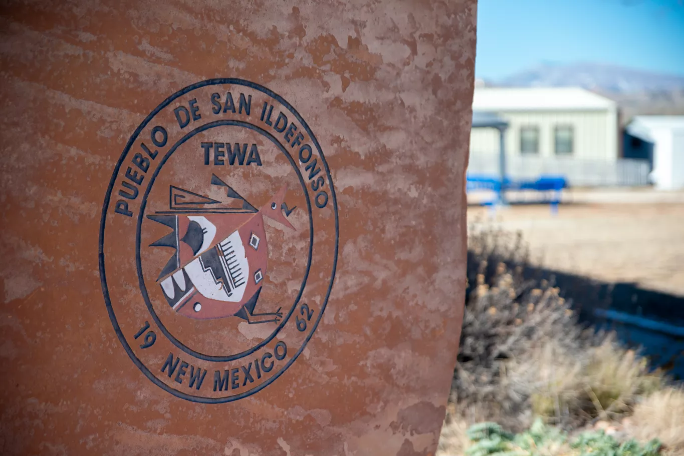 Bolder with "Pueblo De San Ildefonso" logo