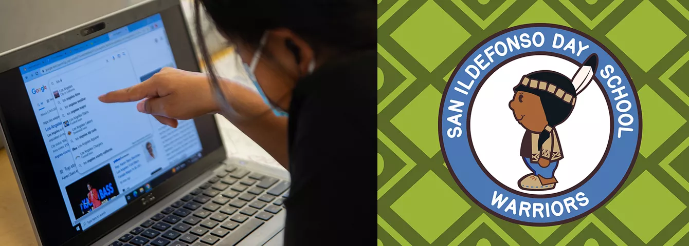 student using a laptop beside "San Ildefonso Day School" logo.